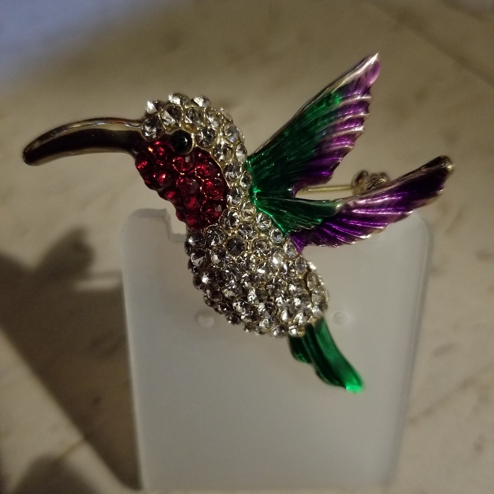 Brooch.